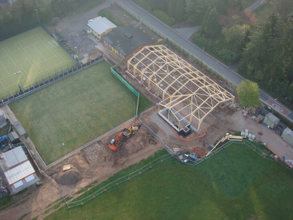 Aerial view of ongoing construction at Cookley Village Hall with new sports facilities.