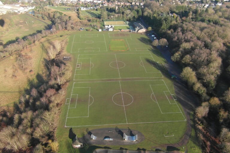 Aerial view of the historic sports field at Cookley Village Hall and surrounding playing fields.